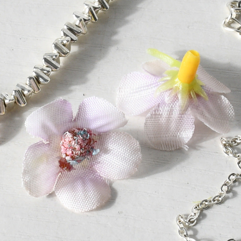 Glitzernde Blumen-Haaraccessoires