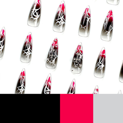 Kunstvolle Stiletto-Nägel mit eleganter Dekoration und modernen Akzenten Brehn