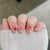 Dekoratives Press-On Nagelset mit floralen und Schleifenakzenten Brehn