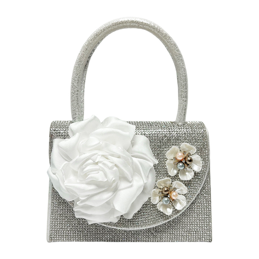 Blumengeschmückte Handtasche für den Abend