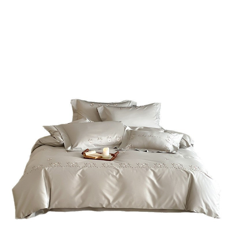 Bestickte Baumwollsatin Bettwäsche Set mit floralem Rand und dekorativen Kissenbezügen