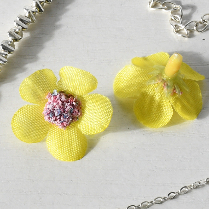 Glitzernde Blumen-Haaraccessoires