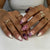 Künstlerisches Florales und Texturiertes Press-On Nagelset Brehn