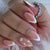 Kunstnagelset mit kreativem Herzen- und Glitzermotiv Brehn