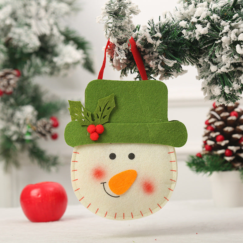 Niedlicher Weihnachtsgnom mit Geschenkesack Brehn