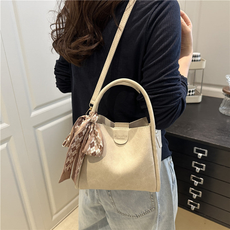 Elegante Schleifenakzent-Handtasche Brehn