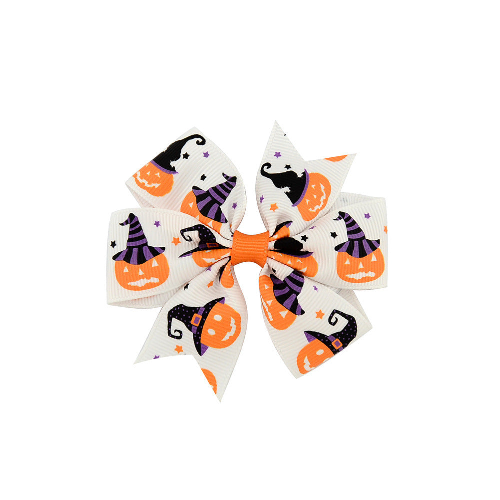 Halloween Schleife mit Kürbis- und Hexen-Motiven