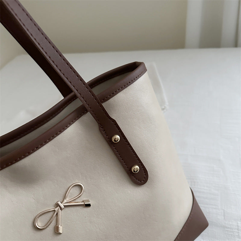 Elegante Faux-Leder-Tote-Tasche mit Akzent-Schleife