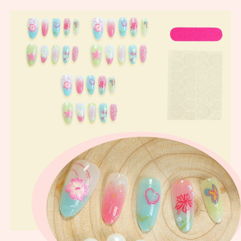 Kunstnagelset mit maritimen Motiven und bunten Akzenten Brehn