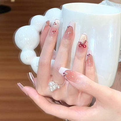 Press-On Nagelkunst mit eleganten Blumen- und Schleifendesigns Brehn