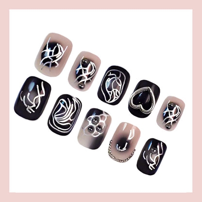 Kunstnagelset mit kreativen Schwarz-Weiß-Mustern Brehn
