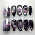 Kreatives Kunstnagelset mit mystischen Designs Brehn