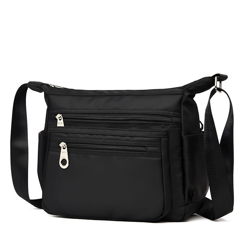 Vielseitige Umhängetasche mit mehreren Taschen Brehn