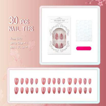 Kunstnagelset mit eleganten Schleifen und Perlenakzenten Brehn