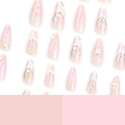 Kunstvolle Nagelverlängerungen mit zweidimensionalem Design und Glitzerakzenten Brehn