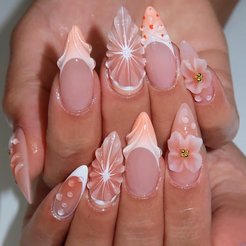 Kunstnagelset mit kreativem Blüten- und Perlen-Design Brehn