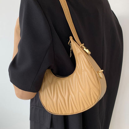 Gepolsterte Mini-Handtasche