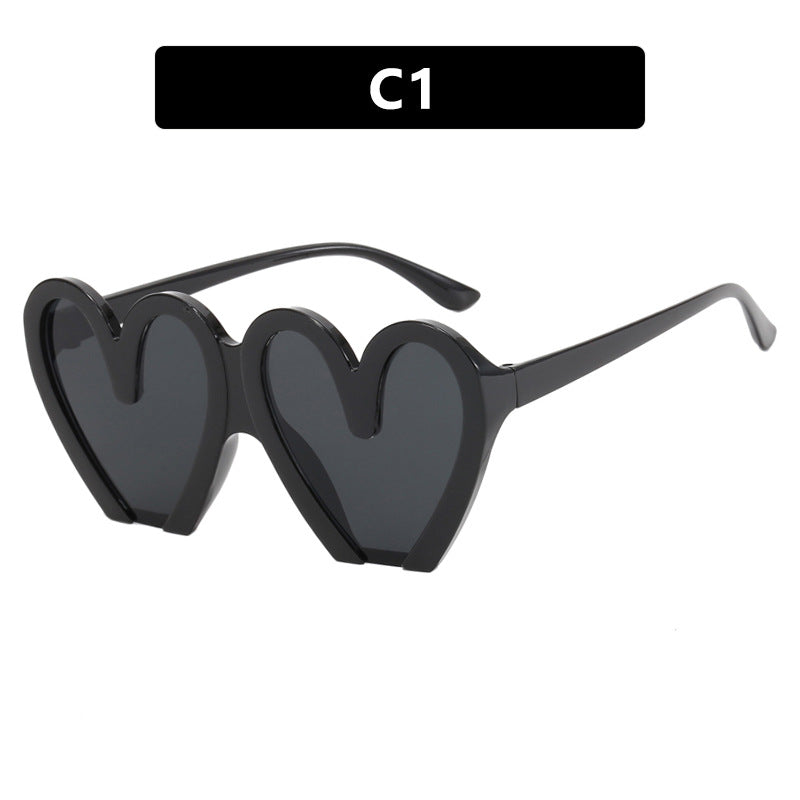 Damen Herzförmige Sonnenbrille mit robustem Kunststoffrahmen und UV-Schutz Brehn
