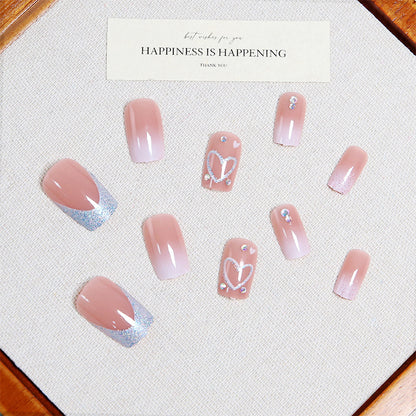 Kunstnagelset mit funkelnden Herz- und Glitzermotiven Brehn