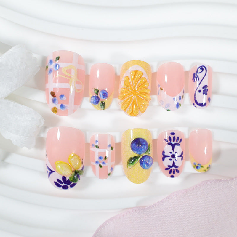 Kunstnagelset mit eleganten Obst- und Blumenmustern Brehn