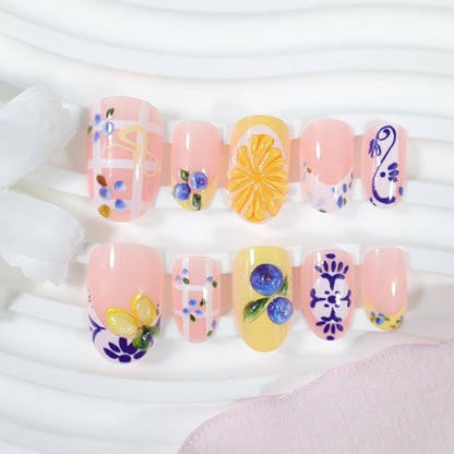 Kunstnagelset mit eleganten Obst- und Blumenmustern Brehn