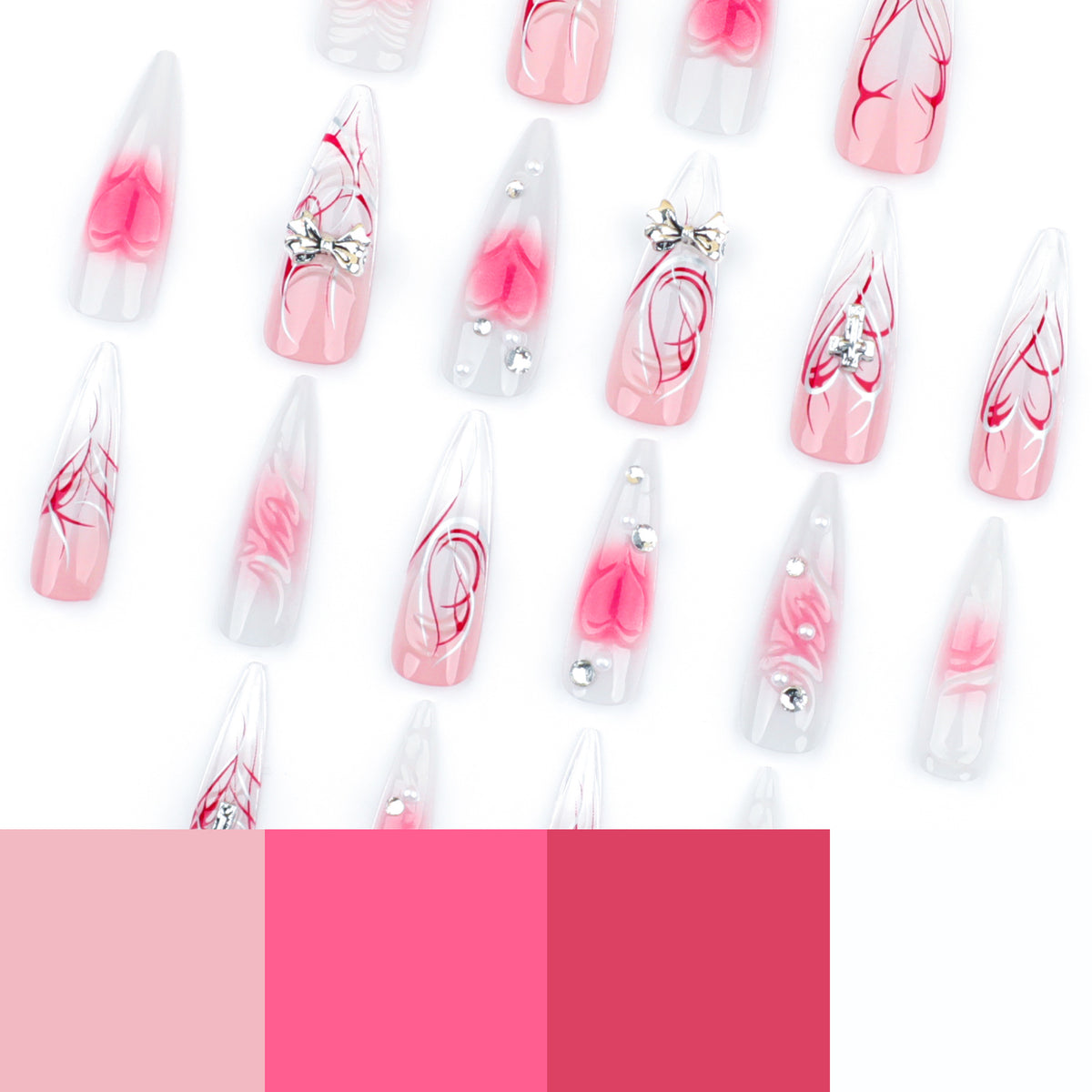 Kunstvolle Stiletto-Nägel mit eleganter floralem Akzent und Glitzerverzierungen Brehn