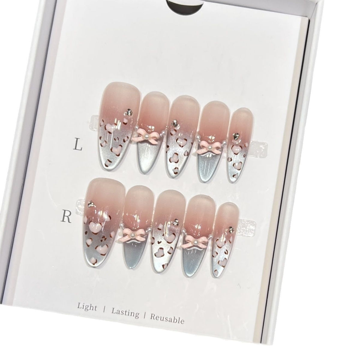 Dekoratives Press-On-Nageldesign mit Schleifenakzenten Brehn