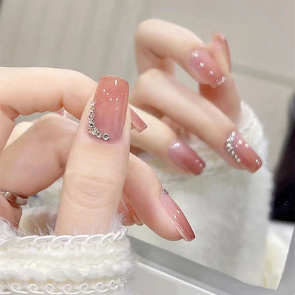 Elegante Ombre Press-On Nagelset mit dekorativen Strassakzenten Brehn