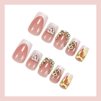 Kunstnagelset mit eleganten Schmuck- und Glitzerelementen Brehn