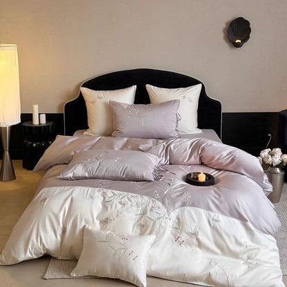 Luxuriöses besticktes Satin-Bettwäscheset mit Wendefunktion und Zierkissen
