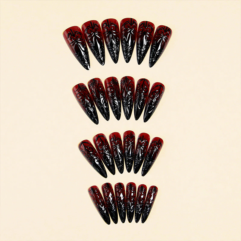 Kunstnägel mit elegantem Gothic-Muster Brehn