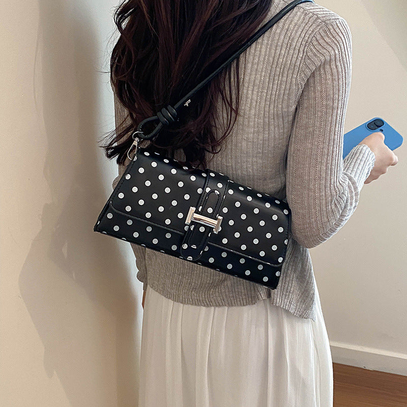 Punktemuster Clutch Handtasche