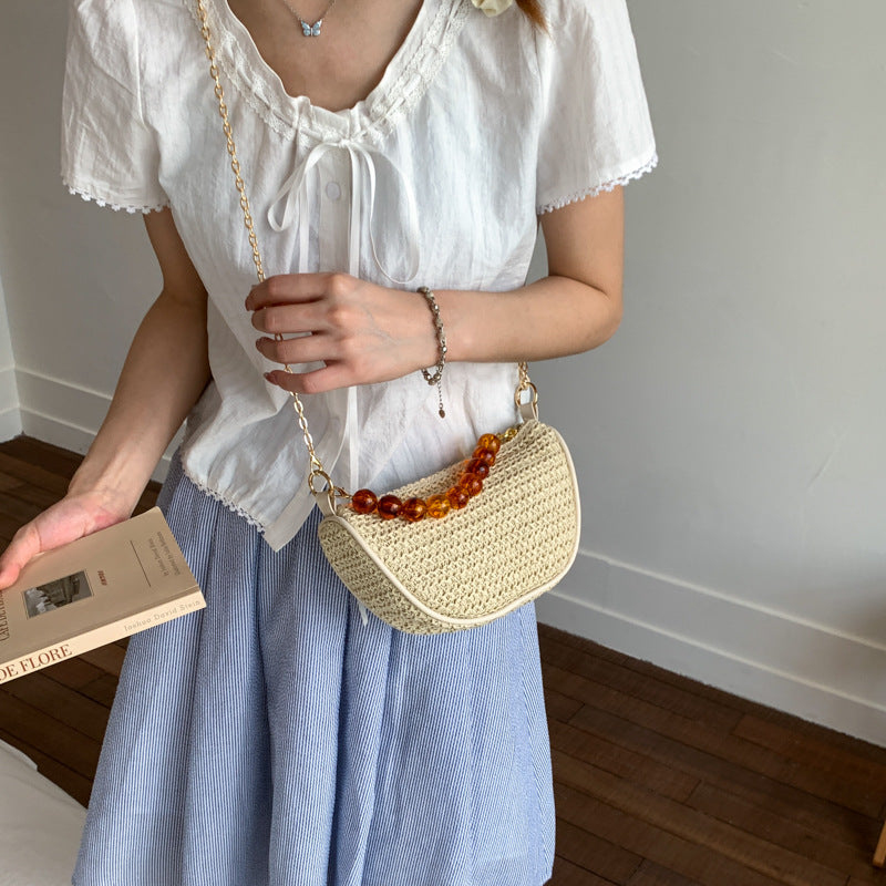 Stylische gewebte Handtasche mit Perlen-Griff Brehn