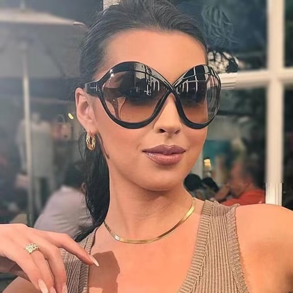 Damen extravagante Cat-Eye Sonnenbrille mit geschwungenem Rahmen Brehn