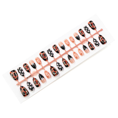 Künstlerisches Press-On Nail Art Set mit floralen Designs Brehn