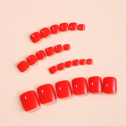 Kunstnagelset in strahlendem Rot Brehn