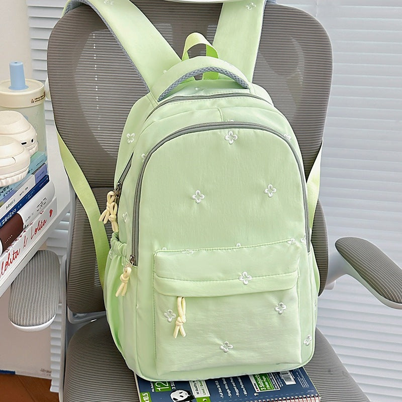 Blumenverzierte leichte Schulrucksack