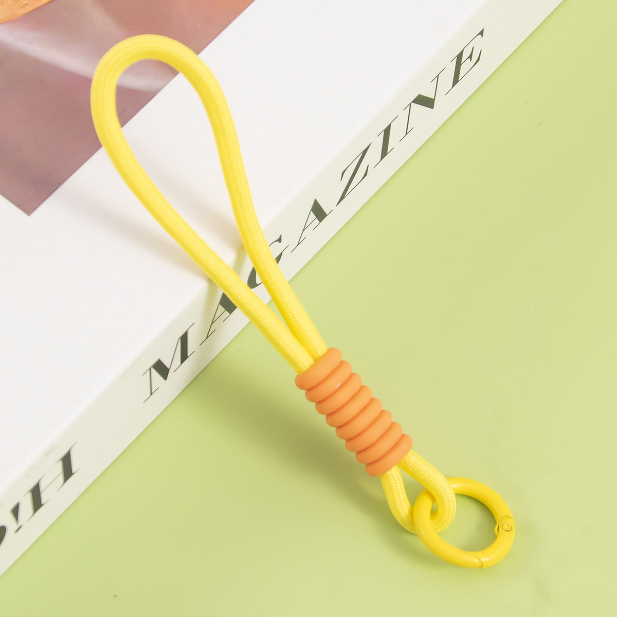 Vielseitiger elastischer Schlüsselringhalter Brehn