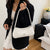 Elegante geschwungene Handtasche Brehn