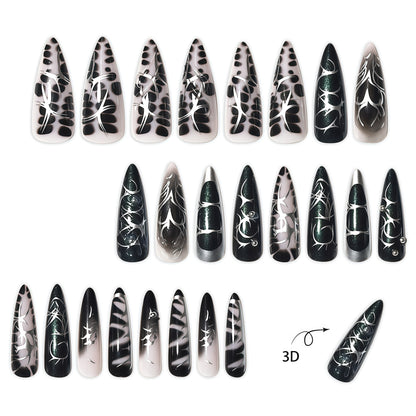 Elegante Stiletto-Nagelkunstverlängerungen mit aufwändigem Design Brehn
