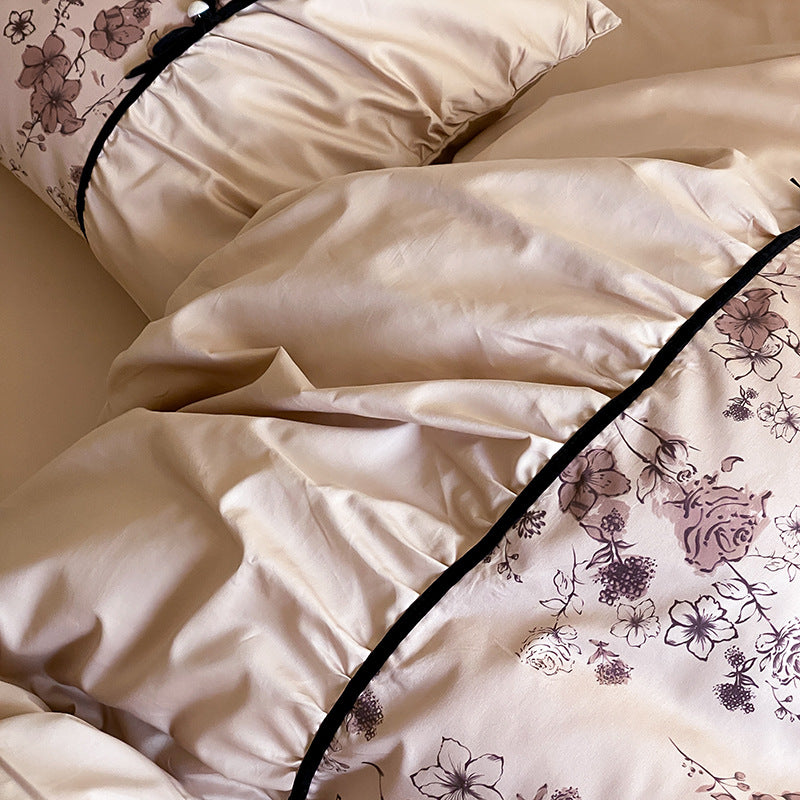 Luxuriöses Satin-Bettwäsche-Set mit floralem Print und Rüschen
