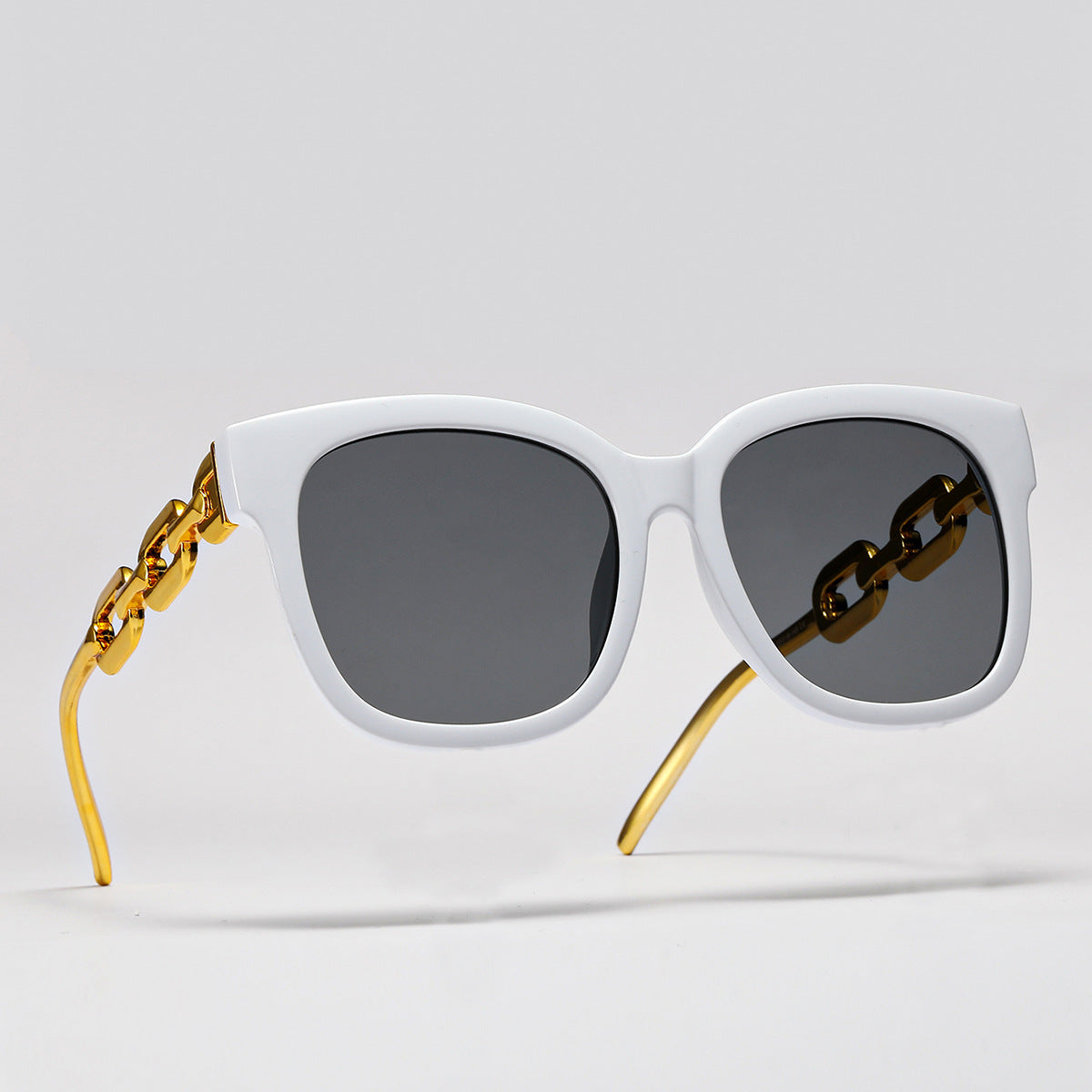 Damen modische oversized Sonnenbrille mit luxuriösem Kettenrahmen Brehn