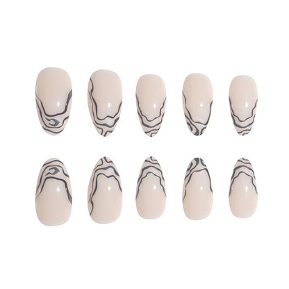 Elegantes Stiletto Press-On Nagelset mit Marmor-Details Brehn