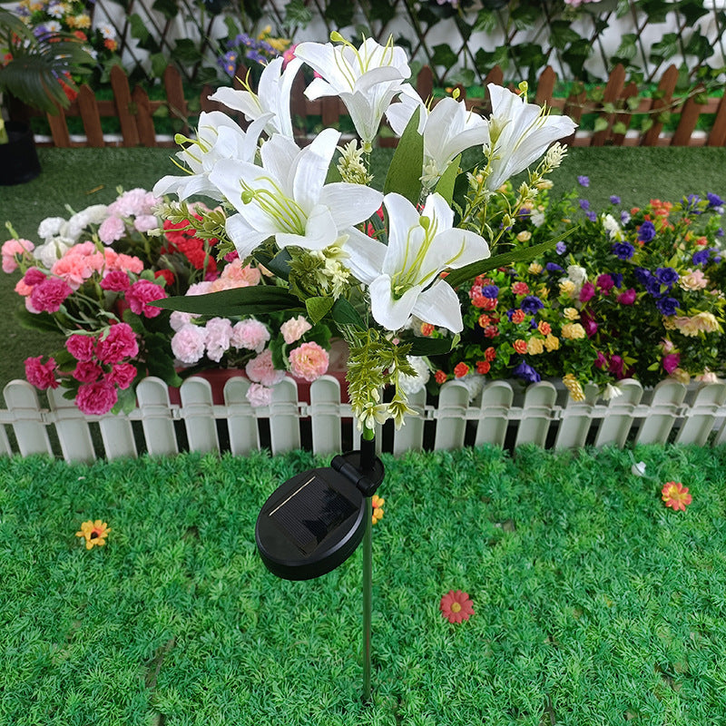 Solar LED-Lilie Gartensteckerlicht mit integrierter Feenlichterkette und lebensechten Seidenblüten Brehn