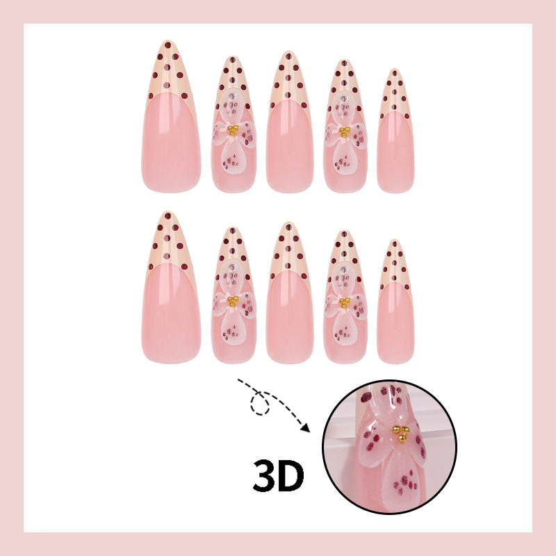 Kunstnagelset mit eleganten Blüten- und Punktemotiven Brehn