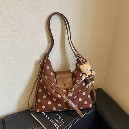 Modische gepunktete Schultertasche