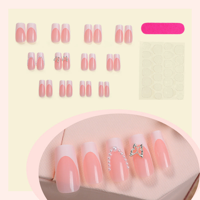 Künstlerisches Press-On Nagelset mit Schmetterlings- und Juwelenakzenten Brehn