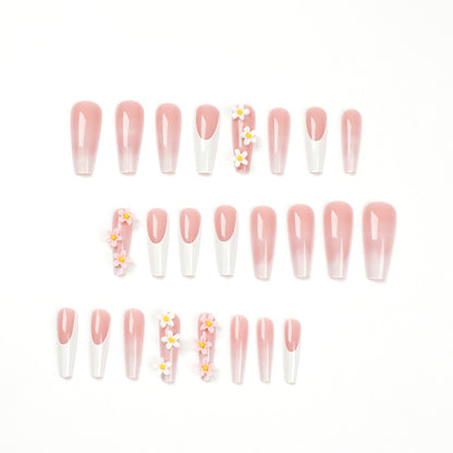 Kunstvolle Nagelverlängerungen mit elegantem Farbverlauf und kreativen Blumenakzenten Brehn