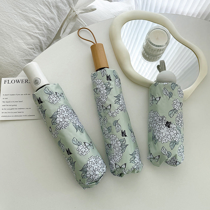 Damen Faltbarer Regenschirm mit innovativem Floral-Design Brehn