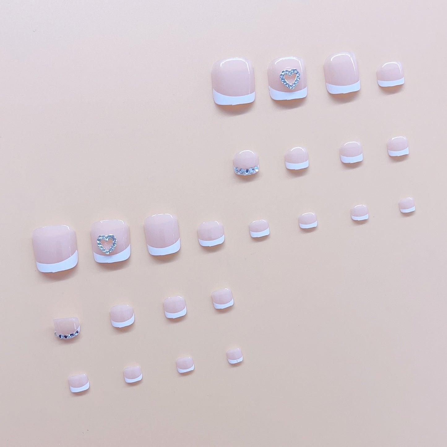 Fußnagelkunstset mit eleganten Glitzer- und Herzverzierungen Brehn